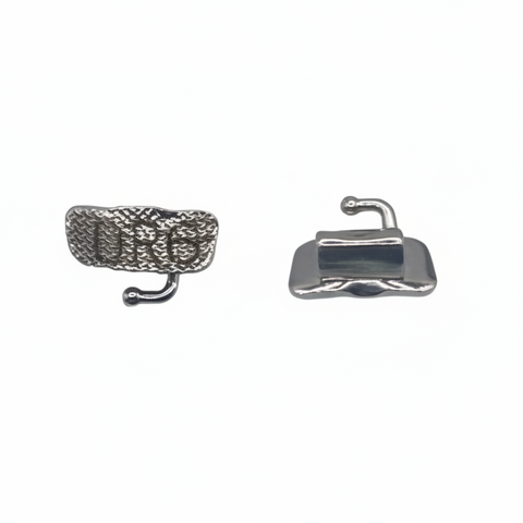 High-resolution image of orthodontic first molar tubes with bondable base, MBT prescription, and optional hook feature for precise molar control in braces treatment